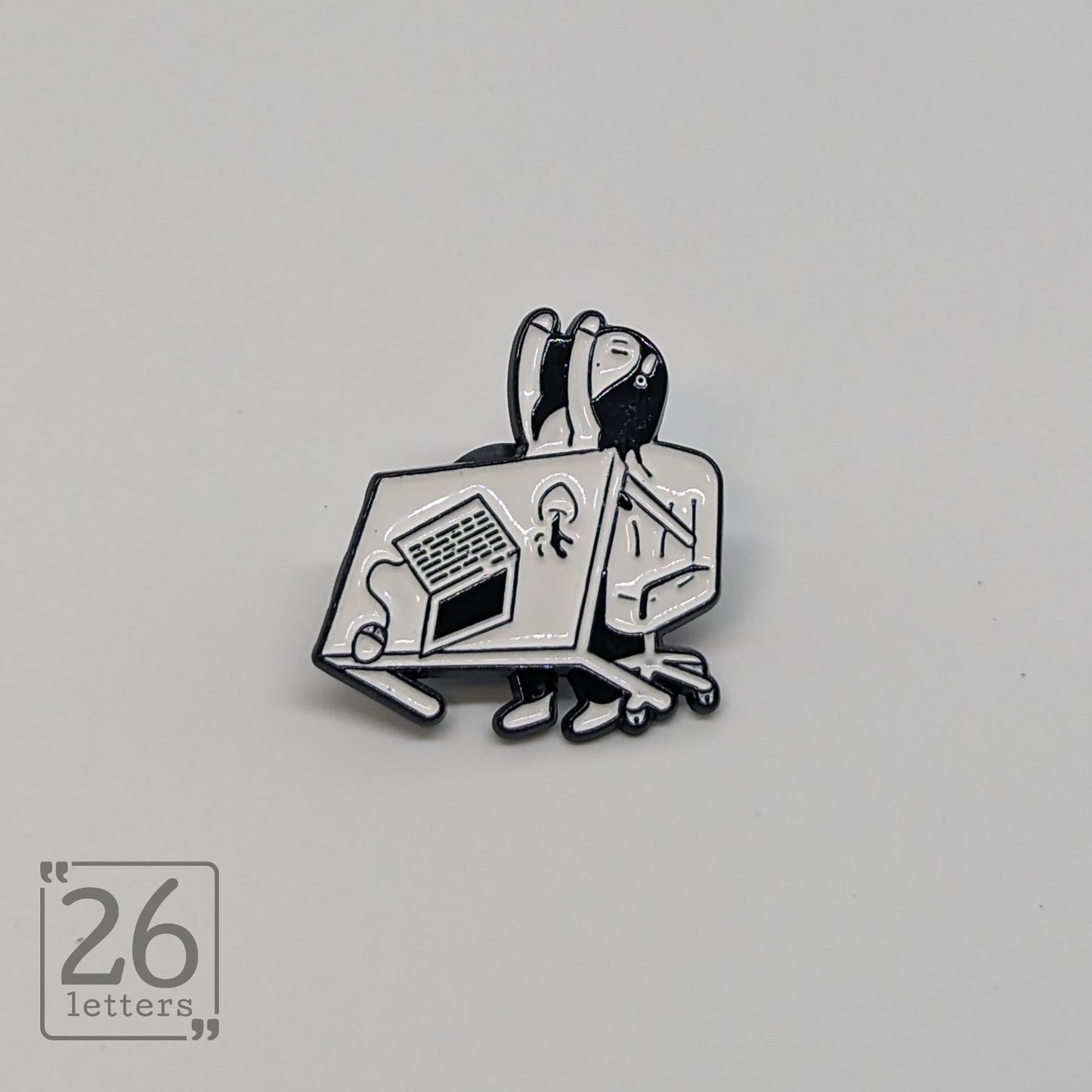 Desk Throwing Enamel Pin