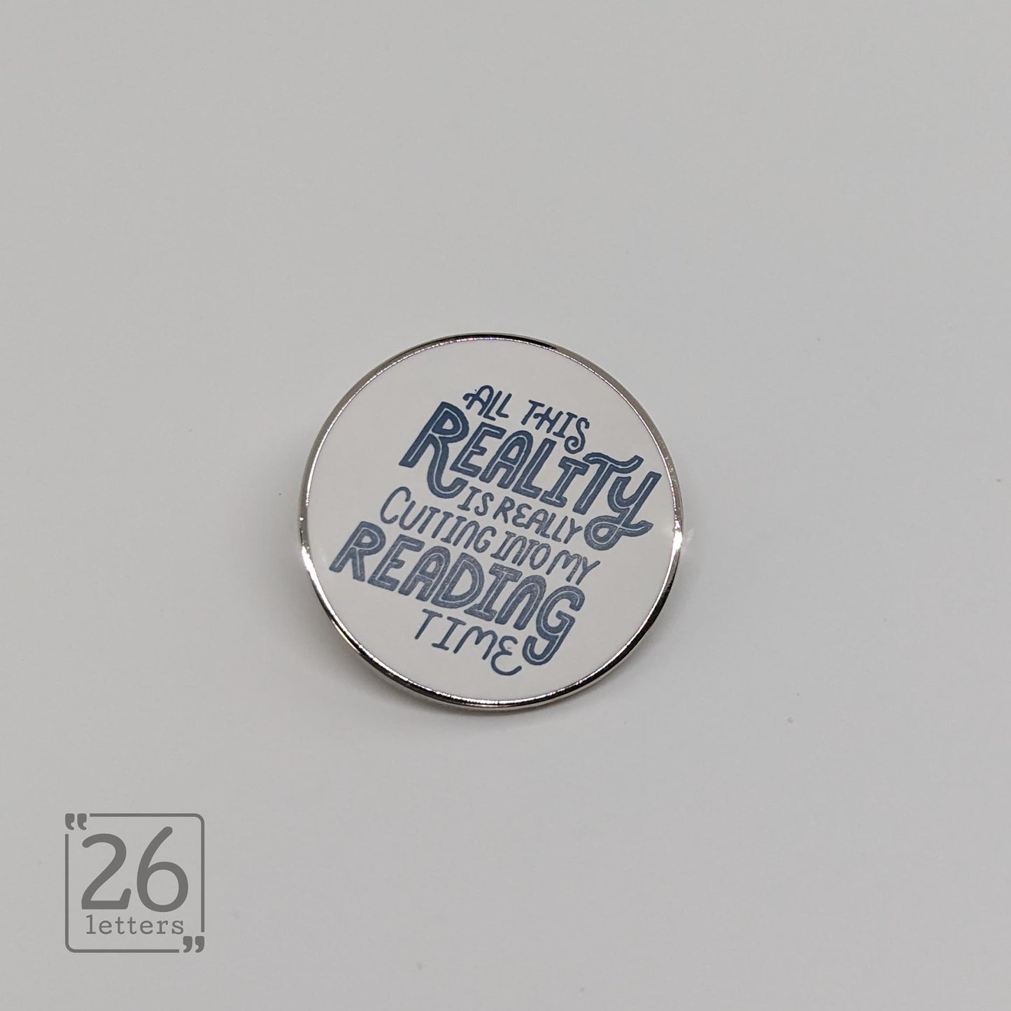 "All Of This Reality Is Really Cutting Into My Reading Time" White Enamel Pin