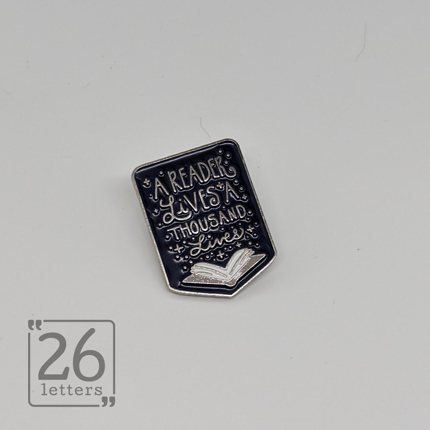 "A Reader Lives A Thousand Lives" Enamel Pin